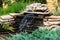 Small rockery with waterfall in a garden