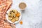 Small round waffles and a coffee on grey background, flat lay