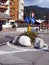 small roundabout with stones and flowers in Madonna di Campiglio in the Dolomites