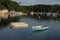 Small rowing boats on calm water