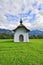Small rural chapel on a meadow