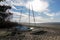 Small sail boat in sand beach in Arcachon bay in Andernos France