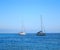 Small sail boats on open water