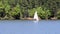 Small Sailboat Crosses left to Right