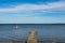 Small sailboat in the water near the coast of Denmark