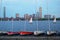 Small sailboats are moored on a dock near Boston