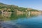 Small sailing boat navigating the calm water