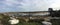 Small sailing boats moored at low tide, on the Norfolk coast estuary