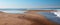 Small sandbar where the Pacific ocean and the Santa Clara river meet at Surfers Knoll beach in Ventura California USA