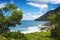 Small sandy beach between volcanic rocks