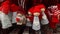 Small Santa Claus puppets and Christmas angels to hang as an ornament on the Christmas tree
