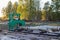 A small sawmill for processing wood in the countryside. Aspen logs