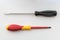 Small screwdriver and phillips screwdriver, close up