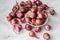 small shallots on a light background