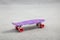 Small size modern purple plastic skateboard