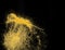 Small size yellow Sand flying explosion, gold cheese sands grain wave explode. Abstract cloud fly. Yellow colored sand splash