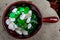 Small Skillet with Green and White Rocks