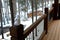 Small Snowman on Railing at Cabin Rustic