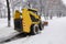 A small snowplow for snow removal in the city. Russia