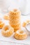 Small sponge cakes with cottage cheese. Ring cakes on white background