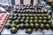 Small sponge cakes laid out on a metal tray