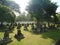 Small statue look like cemetery Buddhist Prambanan temple complex the largest temple in java, Central Java, Indonesia