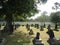 Small statue look like cemetery Buddhist Prambanan temple complex the largest temple in java, Central Java, Indonesia