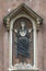 Small statue in the window, Venice, Italy, summer