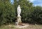 Small stature of the Virgin Mary in a park in Alberobello, Italy