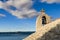 Small stone chappel in the Mediterranean, island of Brac, Croatia, Hvar in background