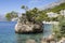 Small stone islet on Punta Rata beach in Brela