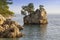 Small stone islet on Punta Rata beach in Brela