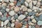 Small stone pebbles. textured stones with each other, attract the eye and soothe