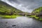 Small stone Wishing Bridge over lake in Gap of Dunloe