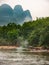 Small stream empties in Li River in Guilin, China