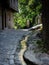 A small stream of water crosses the cobbled streets of the village of La Alberca, Salamanca, Spain