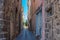 Small street at Agde Centre with old Buildings on a sunny day