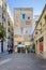 Small street in Barcelona with artfully painted facade