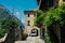 Small street in Bard, Italy. Medieval stone town in the Aosta Valley mountainous region in northern Italy.