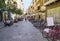 Small street with places for rest in the City of Bologna, Italy.