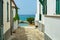 Small street in town Pizzo leading to the beach on tyrrhenian sea, Calabria, Italy