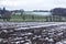 Small strips of snow on plowed fields and meadows.