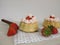Small stuffed strawberry cakes with whipped cream