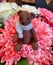 Small stuffed teddy-bear on a flower