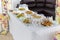 A small table with a delicious buffet of canapes, caviar, sandwiches