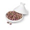 Small tajine with dried rose buds on white background