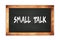 SMALL  TALK text written on wooden frame school blackboard