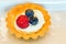 Small tart with mozzarella cream and berries