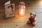 Small teddy bear with heart and bottle light and greeting card