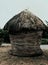 Small thatched roof hut built using natural materials like paddy straw or other natural things